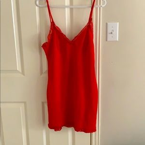 Red dress with lace accents at the top and bottom